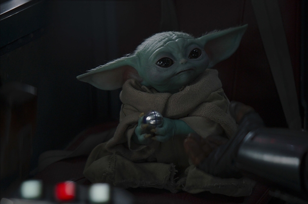 Baby Yoda listens to music on Mandalorian set